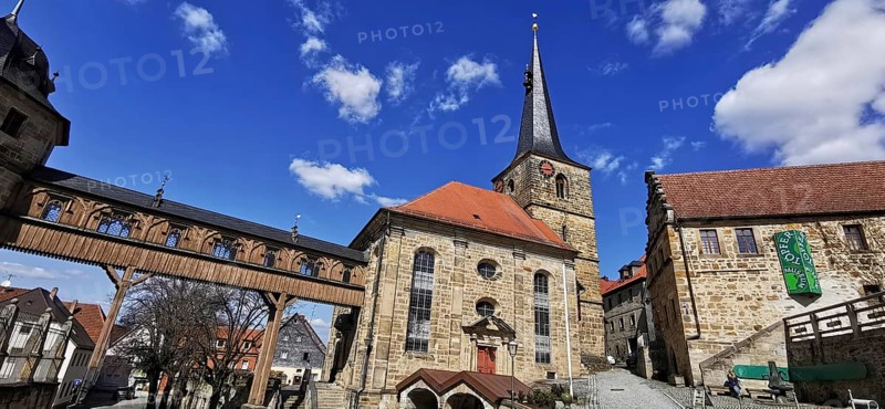 The Protestant-Lutheran St Laurentius Church with the bridge leading to the castle in Thurnau, Kulmbach district, Upper Franconia, Bavaria, Germany