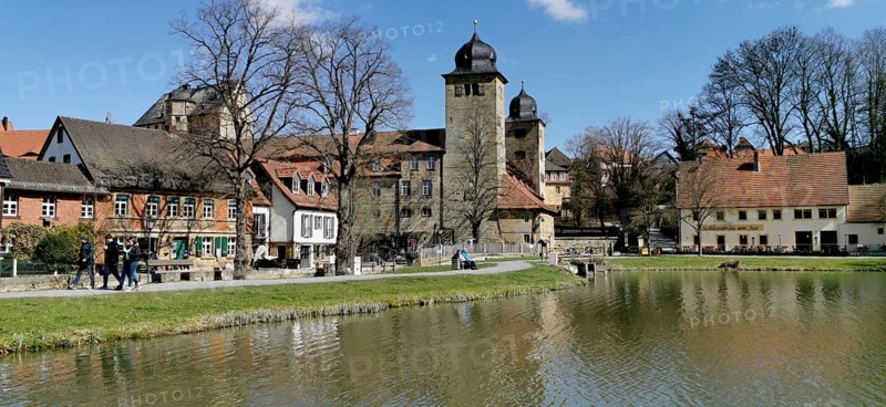 Thurnau Castle and the castle pond in early spring, Thurnau, Kulmbach district, Upper Franconia, Bavaria, Germany