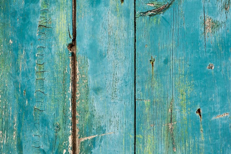 Old wooden door with peeling paint, texture, background, Montenegro, Balkans