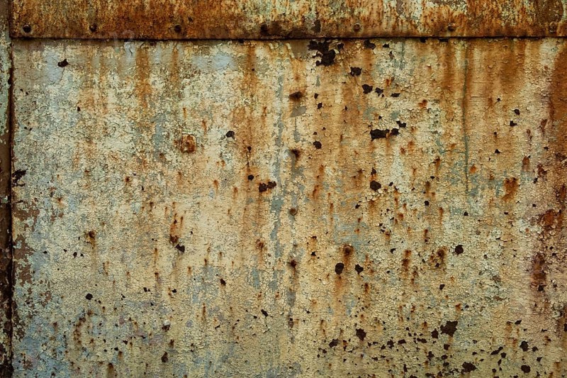 Rusted metal surface with brown and orange discolouration, Istria, Croatia