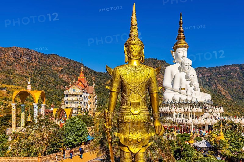 Wat Phra That Sorn Kaew Buddhist temple complex with five-headed Buddha statue, bell tower and temple guard, Phetchabun province, Thailand