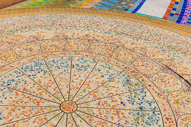 A floor area decorated with colorful mosaic tiles, Buddhist temple complex Wat Phra That Sorn Kaew, Phetchabun province, Thailand