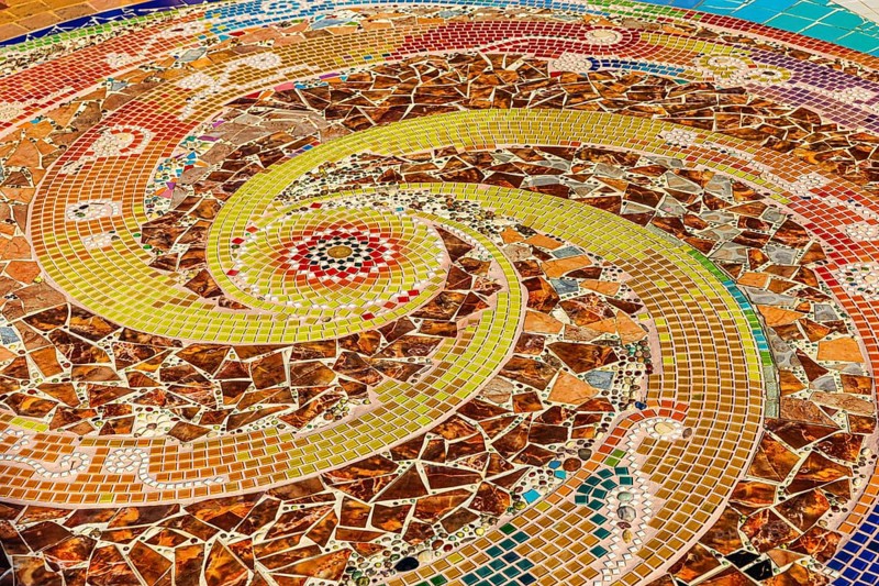 A floor area decorated with colorful mosaic tiles, Buddhist temple complex Wat Phra That Sorn Kaew, Phetchabun province, Thailand