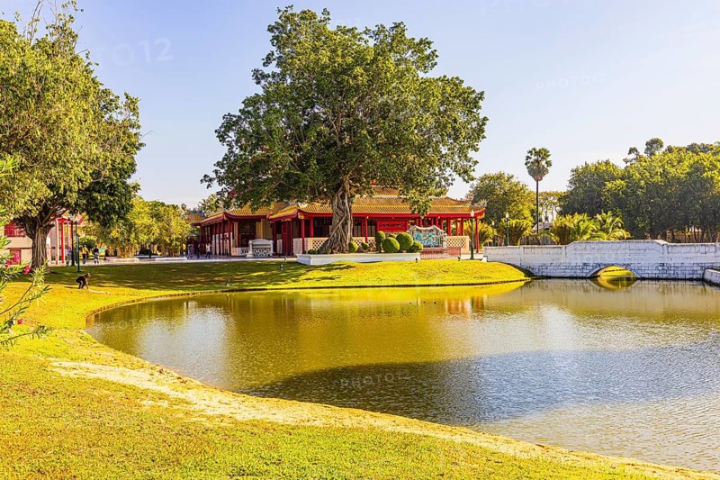 Small pond in the royal park, in the back the Wehat-Chamrun residence, Thai King's summer palace, Bang Pa-In, near Ayutthaya, Thailand
