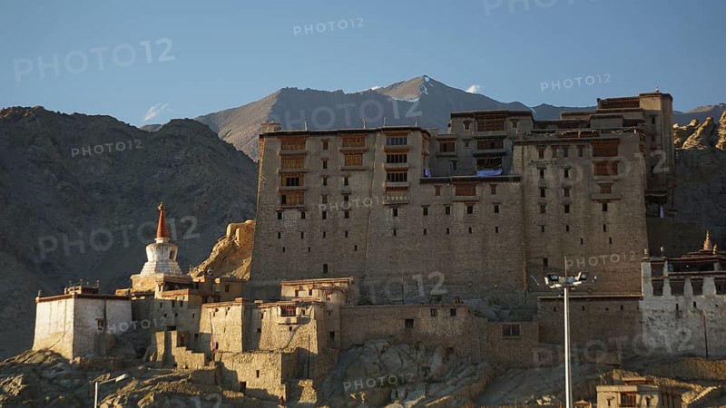 Leh Palace in mountainous landscape during twilight, Leh, trekking in Ladakh, Himalayas, India