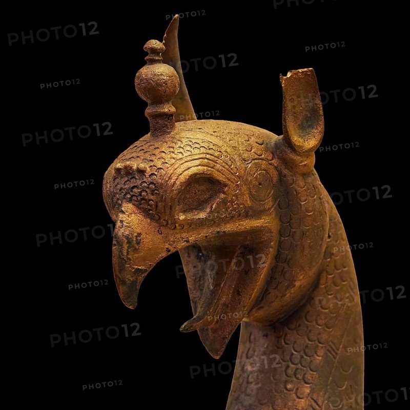 Bronze griffin protome, detailed bronze image of a mythological being with decorative headdress, Olympia Archaeological Museum, Ancient Olympia, Olympia, Peloponnese, Greece