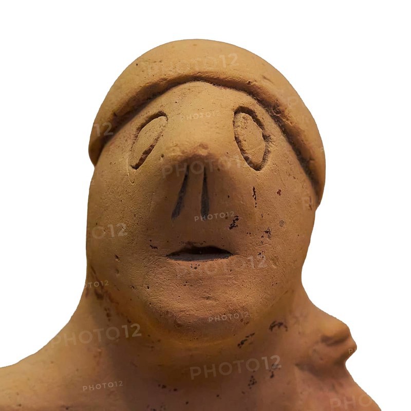 Anthropomorphic votive statuette, abstract clay figure with indicated headdress and simple details, Olympia Archaeological Museum, Ancient Olympia, Olympia, Peloponnese, Greece