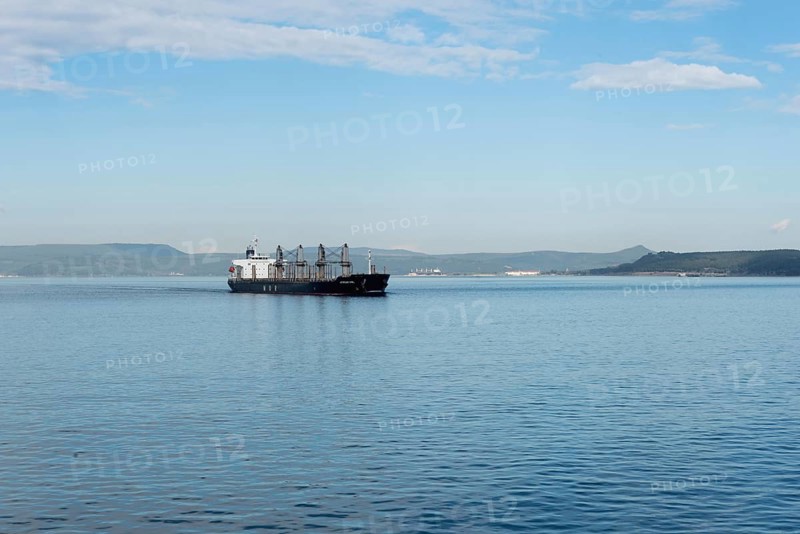 Canakkale, Turkey. February 18th 2022 The African Owl bulk cargo ship passing through the Dardanelles straight near the Gallipoli Peninsular and the Turkish port city of Canakkale