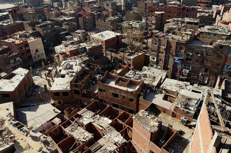 Cairo, Egypt. January 15th 2013 Residential housing in the Qaytbay neighbourhood of the Northern Cemetery known as the City of the Dead, an overcrowded suburb of Cairo, the Egyptian capital