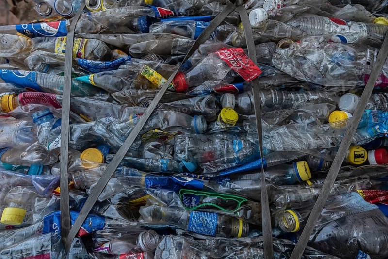 Cairo, Egypt. November 26th 2022 Compressed stack of plastic bottles collected by local fishermen from the River Nile ready to be sold and recycled