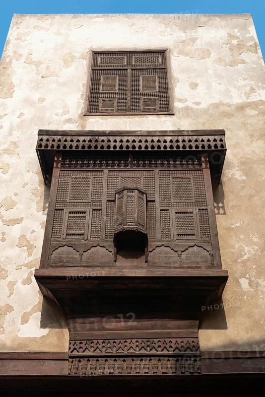 Cairo, Egypt. December 7th 2022 Traditional Arabic Islamic architecture Mashrabiya window of restored building on Darb al Asfar, al Muiz Street, Khan el Khalili bazaar, Islamic Cairo, Egypt