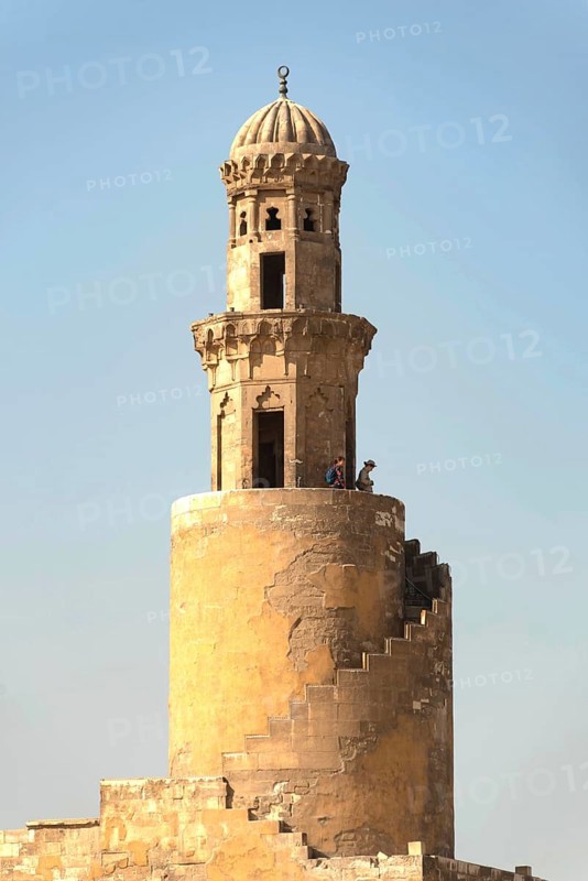Cairo, Egypt. November 29th 2022 Tourists climb the Spiral Tulunid Dynasty Minaret of Ibn Tulin Mosque in Cairo, one of the oldest mosques in Egypt