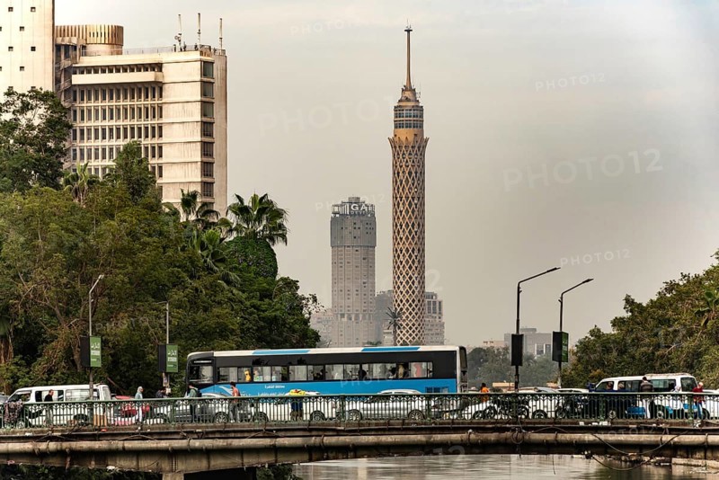 Cairo, Egypt, November 26th 2022 Egyptian commuter bus in traffic on a road bridge over the River Nile in Downtown Cairo, Egypt