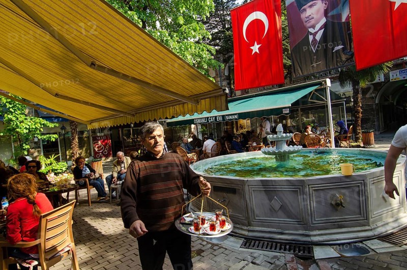 Bursa, Turkey. April 21st 2014 Turkish tea being served in an outdoor cafe, Bursa City, Turkey