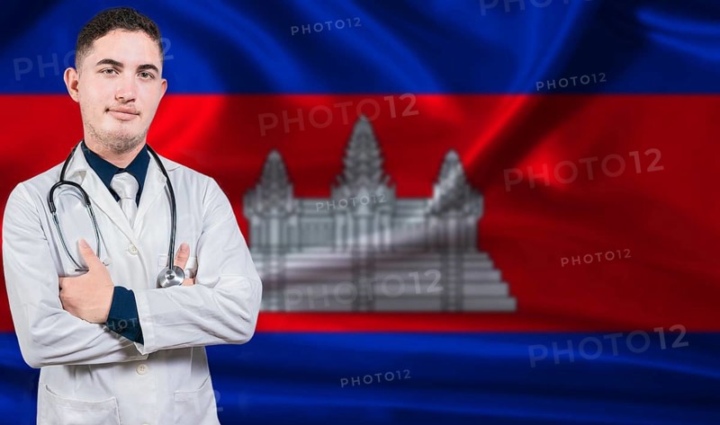 Portrait of medical professional on Cambodia flag background. Cambodian national health system