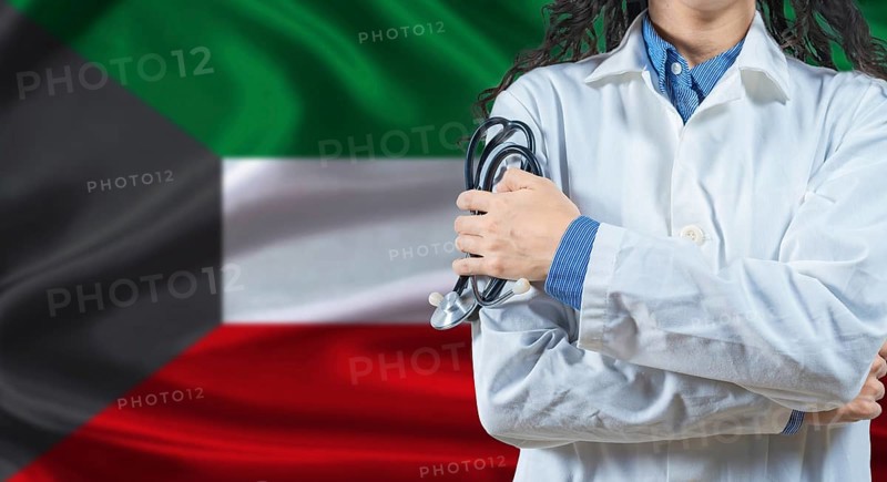 Healthcare professional with Kuwait flag background. Professional doctor holding stethoscope on Kuwait flag background