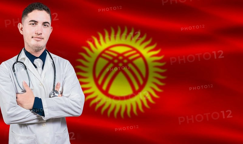 Portrait of medical professional on Kyrgyzstani flag background.Kyrgyzstani national health system
