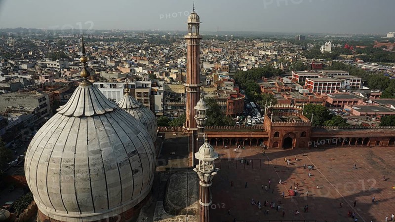 Historic Jama Masjid mosque with domes and minarets overlooks the city, Delhi, India