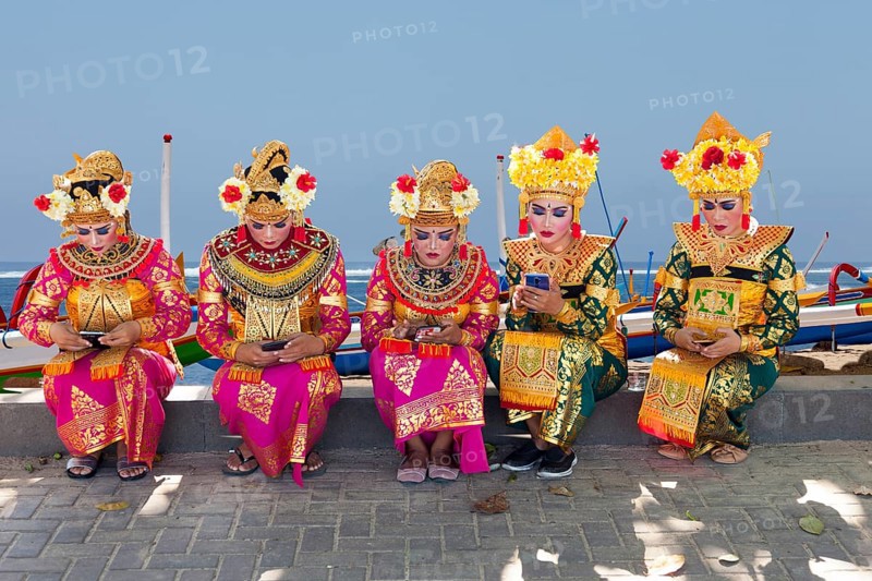 Legong dancers waiting for their performance, (background changed), Sanur, Bali, Indonesia