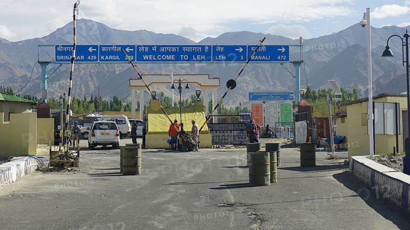 Entrance to Leh with a welcome sign and views of the surrounding mountains, Leh, Ladakh, North India, Himalayas, India