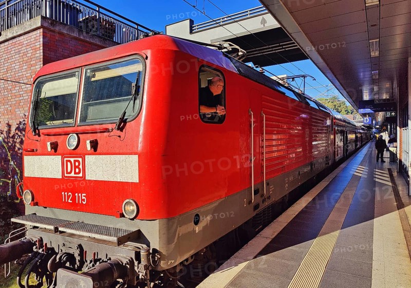 Locomotive with commuter train on the railway track, Gesundbrunnen station, Berlin, Germany