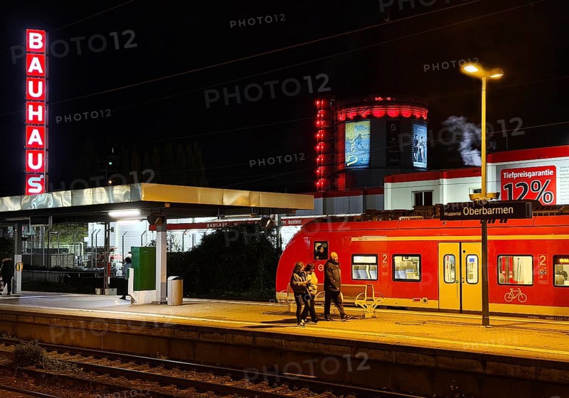 Local train at Oberbamen station with gas boiler at night, Wuppertal, North-Rhine Westphalia, Germany