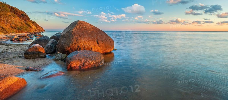 Coastal landscape with large boulders on the Baltic Sea beach in the evening light, Mönchgut Nature Reserve, Groß Zicker, Mönchgut Peninsula, Rügen Island, Mecklenburg-Western Pomerania, Germany