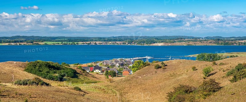 Hilly landscape in the Zicker Mountains, including Zicker Alps, view over the lagoon landscape to the village of Gager with harbour, Mönchgut nature reserve, Gross Zicker, Mönchgut peninsula, Rügen island, Mecklenburg-Western Pomerania, Germany
