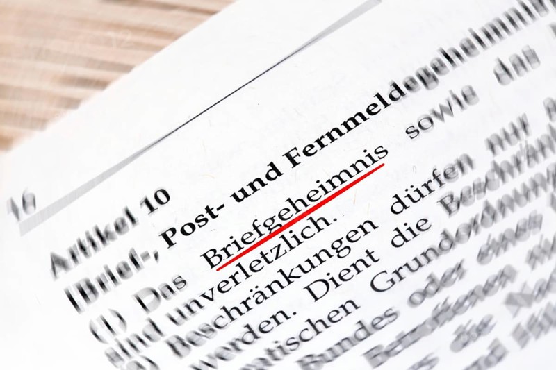 Secrecy of letters Symbolic image: Close-up of the term SECRECY OF LETTERS in Article 10 of the German Basic Law