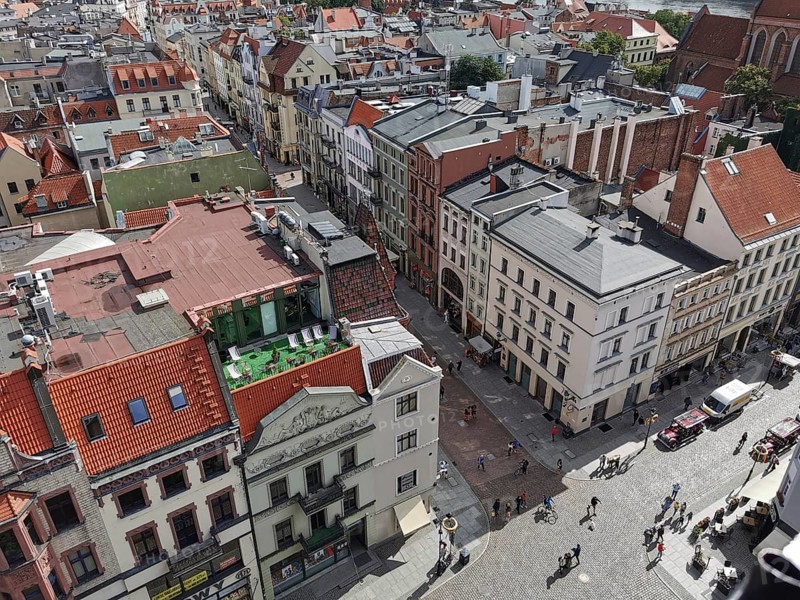 Aerial view of Torun a city with red roofs and a busy street, Torun, Poland
