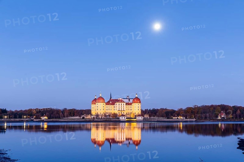 Moritzburg hunting lodge with full moon early in the morning, Meissen district, Saxony, Germany