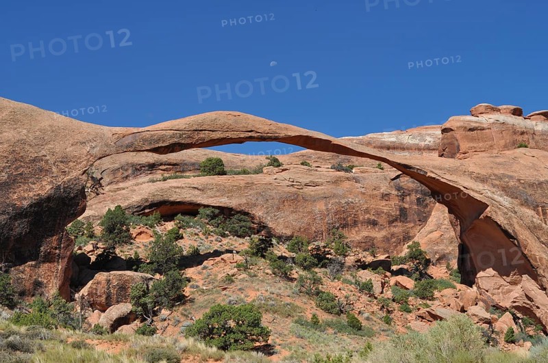 Landscape Arch, an imposing, far-reaching rock arch in a rocky desert environment, Arches National Park, Utah, USA