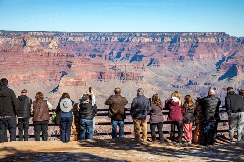 Grand Canyon National Park, Arizona. People lined up on the South Rim to view the Canyon