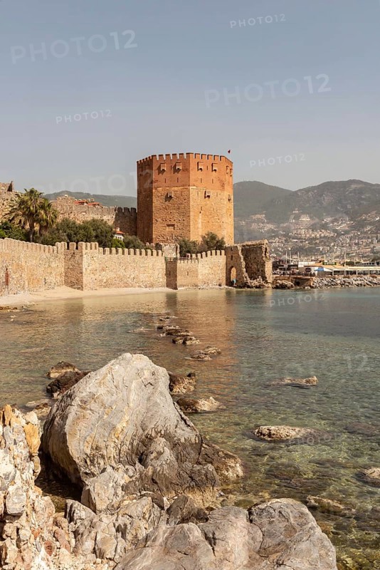 Alanya, Turkey. April 7th 2021 View of the Kizi Kule or Red Tower from the historic ancient castle walls, Alanya Harbour, on the Turkish Mediterranean, Turkey