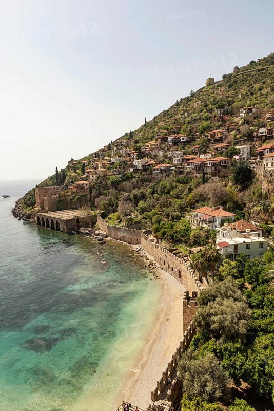 Alanya, Turkey. April 7th 2021 Beautiful view of Alanya peninsular and the old Shipyard and castle walls from the harbour