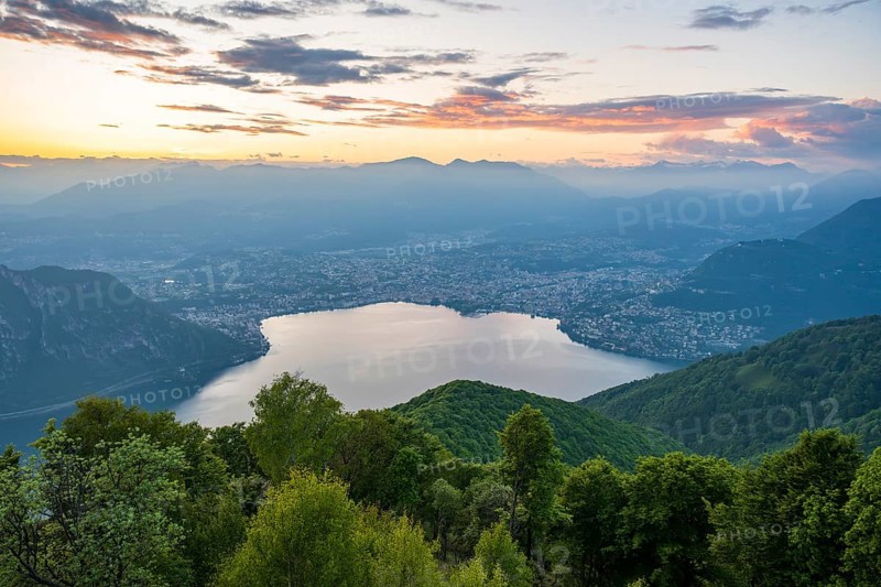 View of Lake Lugano and Lugano from Mount Sighignola at sunset, Balcone Svizzero, Tessin, Switzerland