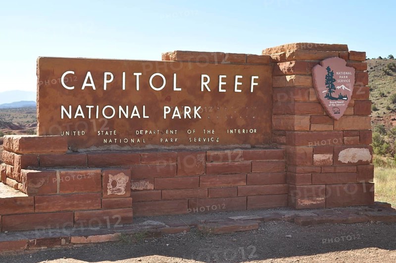 Capitol Reef National Park entrance sign, made of red bricks, surrounded by nature, Capitol Reef National Park, Utha, USA