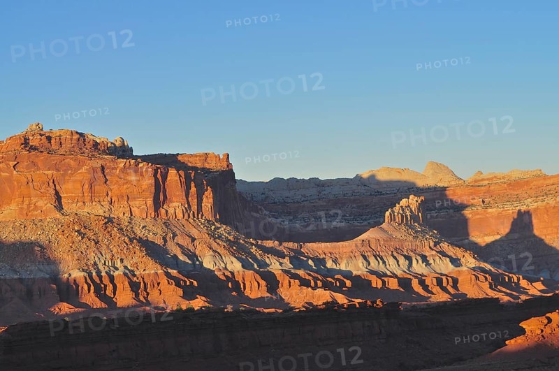 Rocks and shadows in a red desert landscape illuminated by the evening sun, Capitol Reef National Park, Utha, USA
