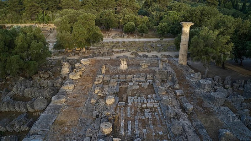 Temple of Zeus in morning light, roof view over ancient ruins with stone pillars in wooded surroundings, drone shot, archaeological site, Ancient Olympia, Olympia, Peloponnese, Greece