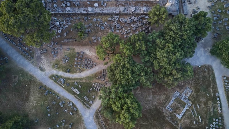 Temple of Zeus, Temple of Zeus, Old Stone Structures Scattered Between Trees and Small Paths, Drone Shot, Archaeological Site, Ancient Olympia, Peloponnese, Greece