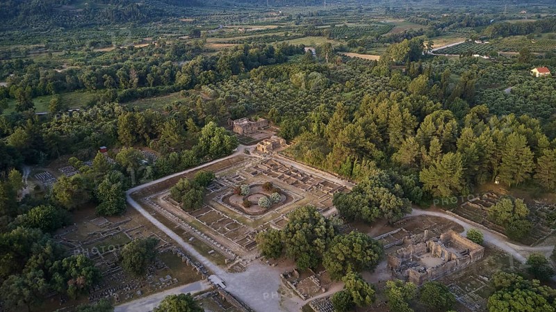 Soft morning light, Leonidaion, workshop of Phidias and early Christian Bailica, Heroon, Theocoleon, wide view of an archaeological site in the forest, drone shot, archaeological site, Ancient Olympia, Olympia, Peloponnese, Greece