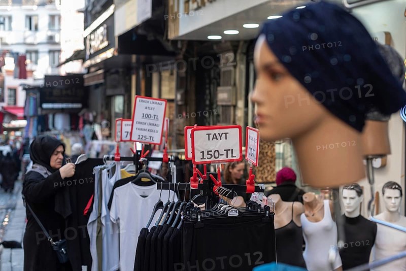 Istanbul, Turkey 7th January 2025. Local shoppers browsing clothes reduced in price in a popular textile bazaar in the Fatih district of Istanbul, Turkey