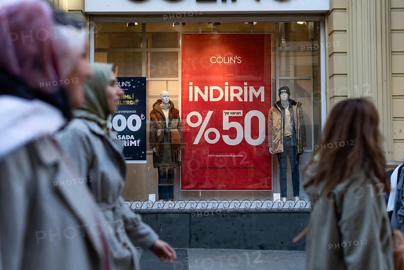 Istanbul, Turkey 7th January 2025. 50% Sale prices displayed in shop window in a busy shopping street in Istanbul, Turkey