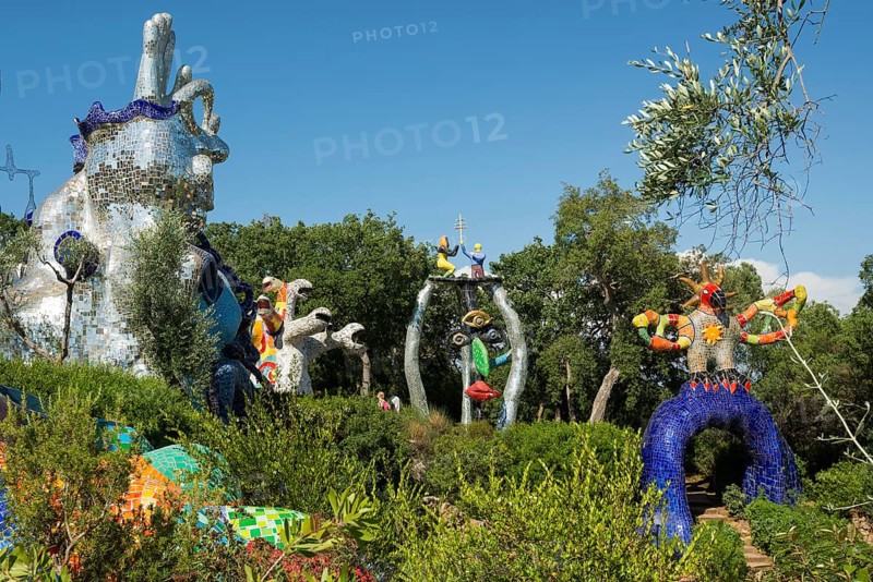 Colourful sculptures made of glass and mirrors, Giardino dei Tarocchi, Garden of Tarot, by Niki de Saint Phalle, near Capalbio, Province of Grosseto, Tuscany, Italy