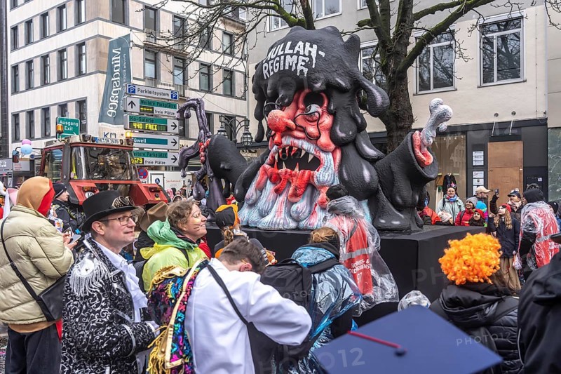 Rose Monday procession in Düsseldorf, theme car by wagon manufacturer Jacques Tilly, topic of mass protests in Iran against the Iranian mullah regime, the government is slowly melting away, North Rhine-Westphalia, Germany