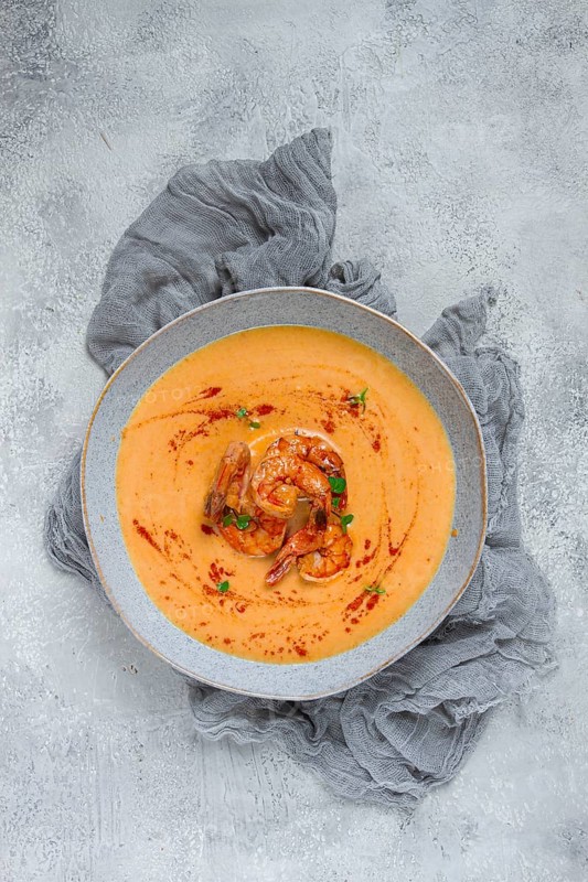 Pumpkin cream soup with shrimp, herbs and spices, homemade, no people