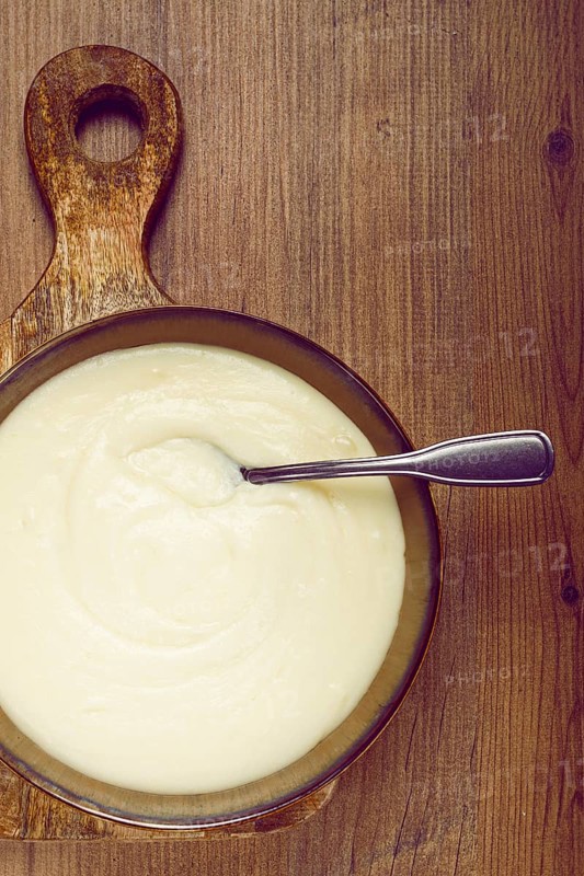 Mashed potatoes, with suluguni cheese, homemade, on a wooden table, no people, top view