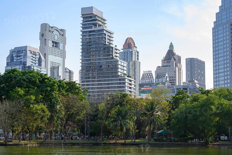 Bangkok, Thailand. March 4th 2025. A rare urban green space in the city centre, high rise modern buildings surrounding Lumphini Park, Bangkok