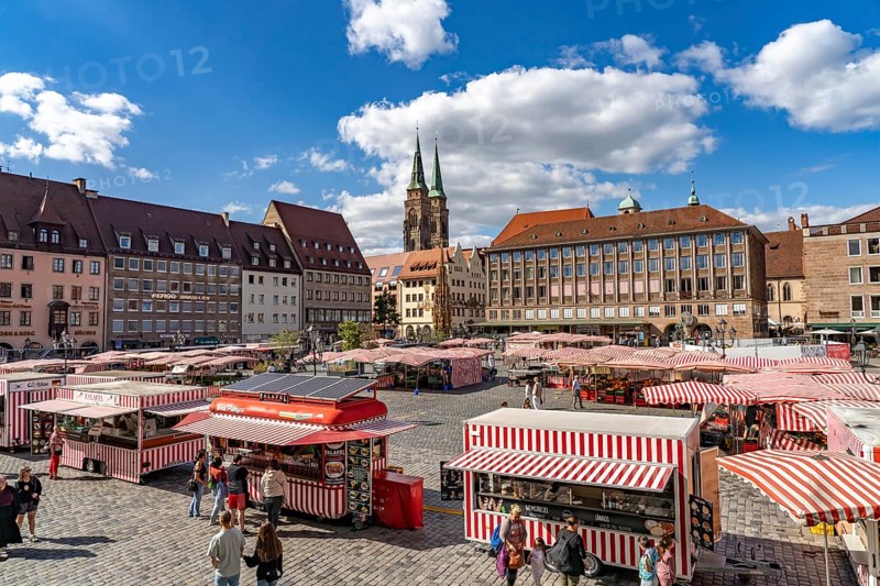 Market stalls on the main market and St. Sebaldus Church in Nuremberg, Bavaria, Germany