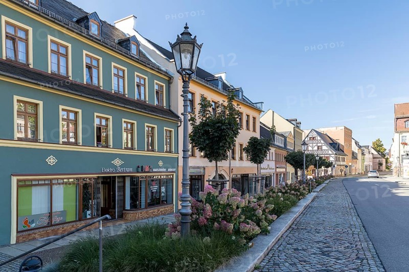 On the Altmarkt, in the background the historic postal goods, Hohenstein-Ernstthal, Saxony, Germany